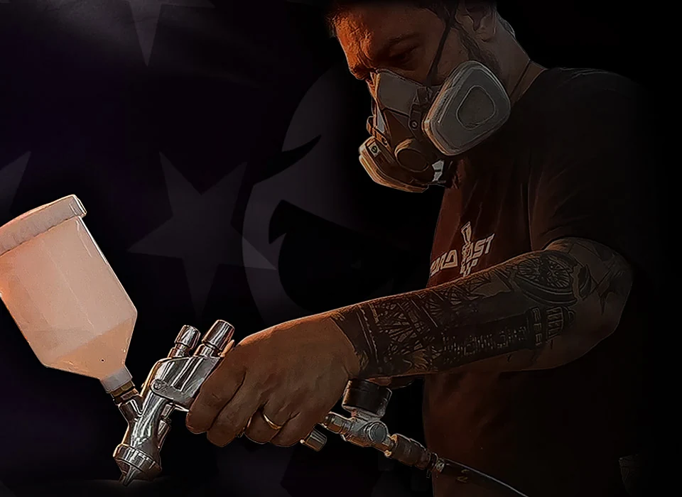 Junior Vieira com a pistola de pintura